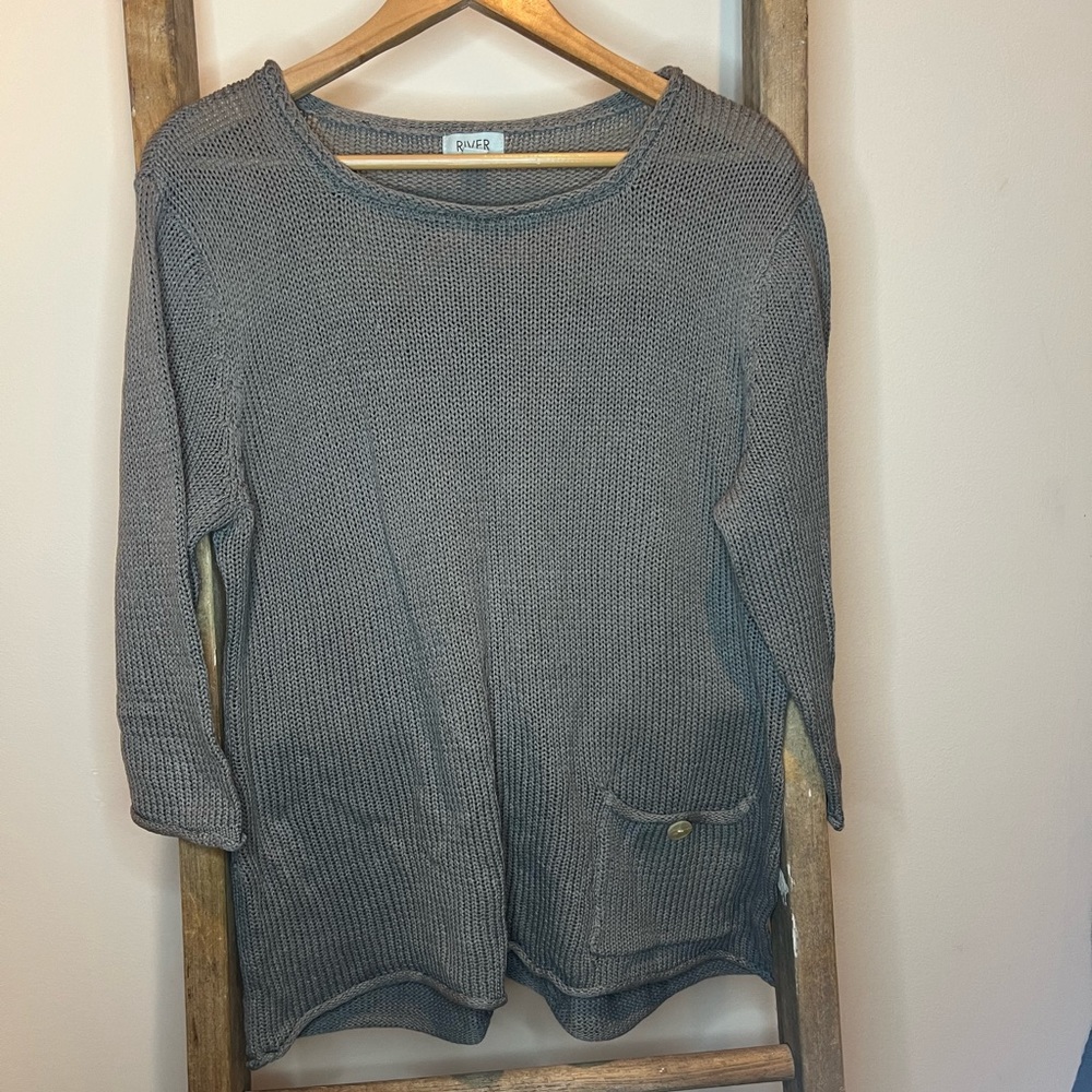 River gray sweater with front pocket and cute button detail in back. Size XL.